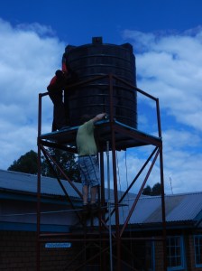 Hooking up to the piping.