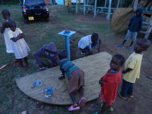 How many kids does it take to help you assemble a Merry-go-round?  3 times this many.