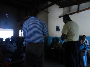 Greg and Pastor Moses giving a message to the Teso Pastor Trainees