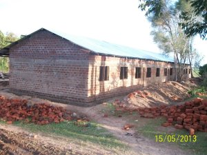 Under roof, steel corrugated.