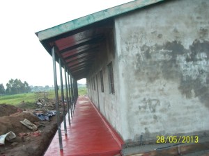 Fascia boards and oxide fresco coverinbg of the floors and sidewalk.