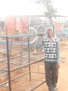 Triple decker steel bunk beds made in Jinja