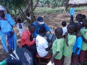 Dr. Randall checking eyes