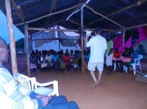 Lights in the church shelter.  Greg giving goodies from our church Sunday School Class and messages of Christ's light in the world.