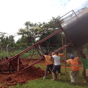 We designed and had a tank stand fabricated locally to hold a 5000 liter tank about 16' off the ground.  This was an event of Egyptian proportions.