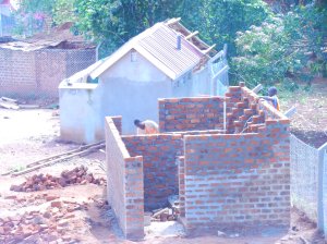 A new latrine/bath house is being finished as well.