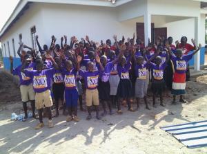 Happy boys and their new dorm building at SOH
