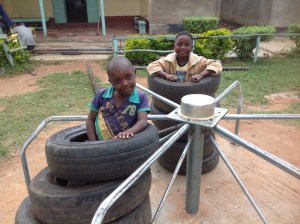 Inspecting the loose tires the kids play with.