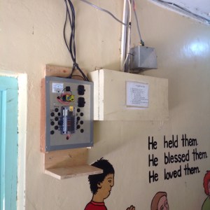 Completed installation of solar powered lighting in the boys dorm and cooking areas.  Moved the switch panel to a better location.